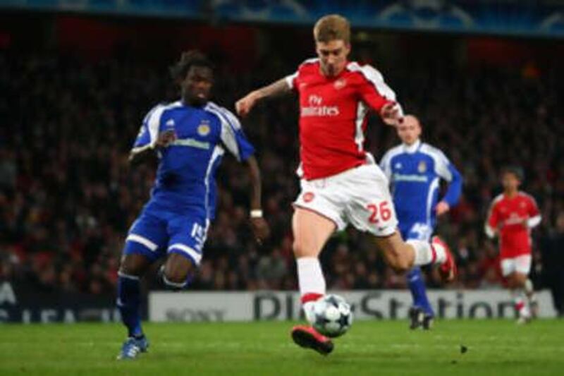 Nicklas Bendtner scores for Arsenal during Group G match against Dynamo Kiev at the Emirates Stadium.