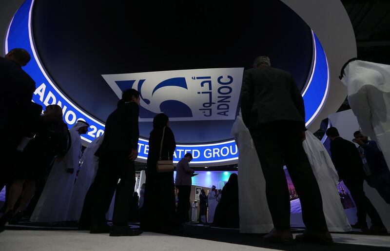 epa07162656 UAE visitors inspect ADNOC section at Abu Dhabi International Petroleum Exhibition and Conference (ADIPEC) in Abu Dhabi, United Arab Emirates, 13 November 2018. ADIPEC, a meeting place of the international oil and gas community, runs between 12 and 15 November 2018.  EPA/ALI HAIDER