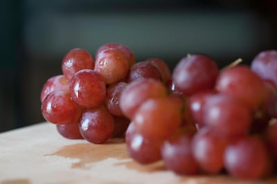 In Spain, people eat 12 grapes for good luck before the clock strikes midnight. Unsplash 