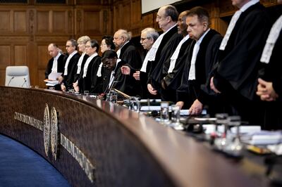 A 16-judge panel led by Lebanon's Nawaf Salam, centre, is hearing the case between Nicaragua and Germany. EPA 
