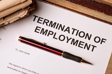 Under the UAE Labour Law, an employer is not permitted to terminate employment when an employee is out of the country. Getty Images