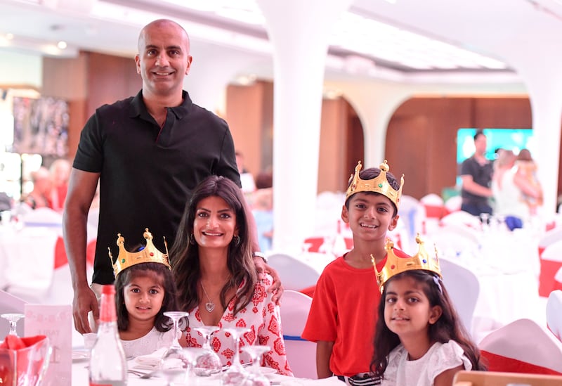 Jay and Polly Pathak, with their three children


