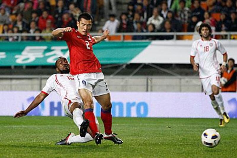 Ismael Matar shoots the ball to score the consolation goal past South Korea's Choi Hyo-jin in Suwon.