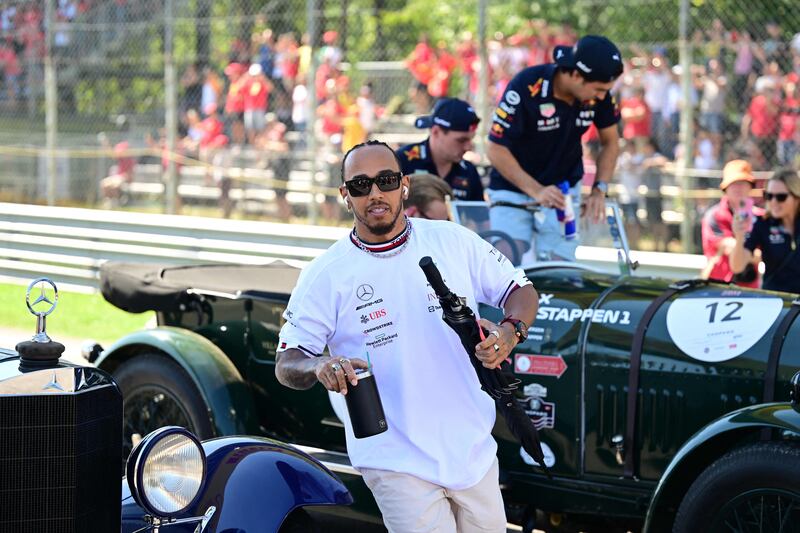 Mercedes driver Lewis Hamilton arrives after the drivers' parade. AFP
