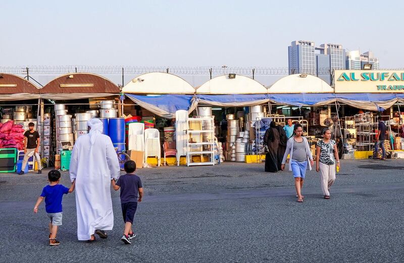 Abu Dhabi, United Arab Emirates, July 17, 2019.  Vendors of Al Mina Photo Project.  Al Mina Souk Market -- Customers cross the street to find their home and kitchenware needs.
Victor Besa/The National
Section:  NA
Reporter: