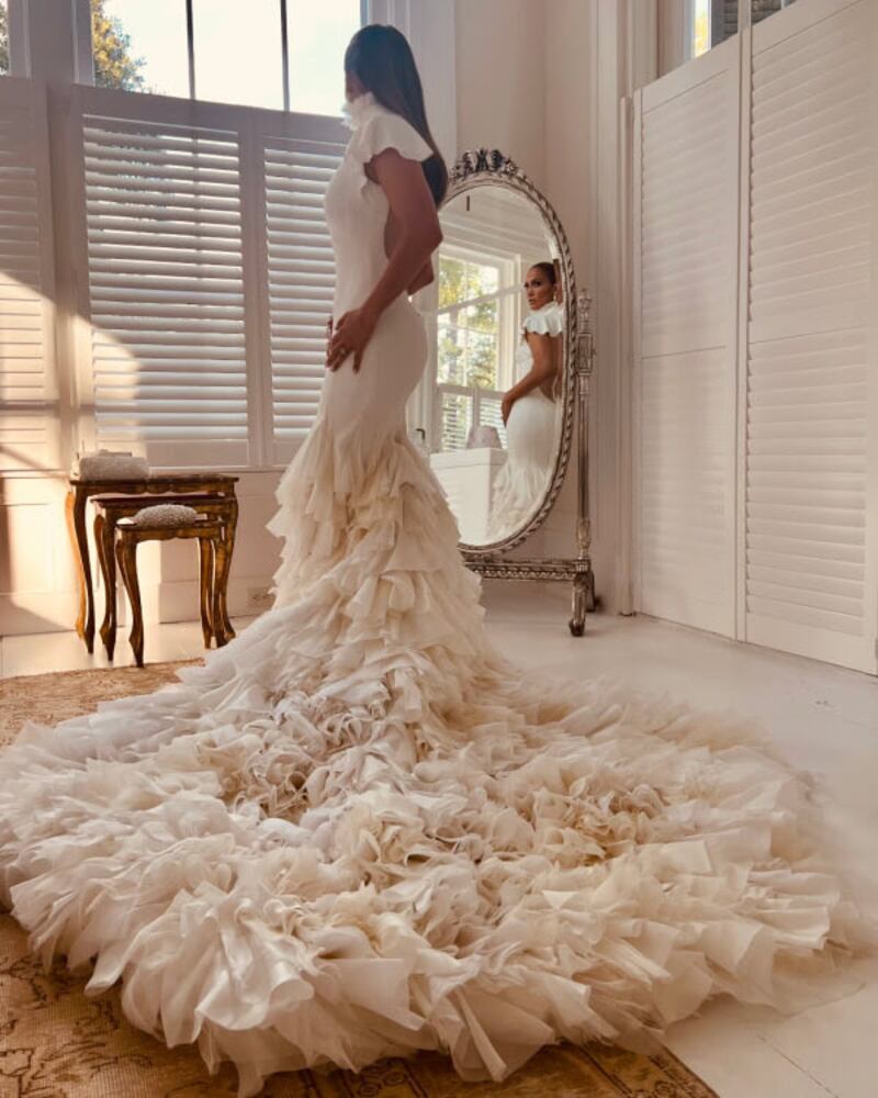 Jennifer Lopez has shared photos of the three Ralph Lauren dresses she wore to marry Ben Affleck at his Georgia home. Photo: OnTheJLo