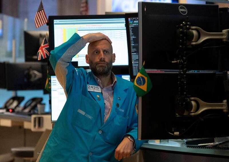 Traders on the floor of the New York Stock Exchange May 31,2019 in New York. Wall Street stocks closed out a downcast May on an especially negative note on Friday, falling hard after President Donald Trump announced new tariff measures on Mexico. Major indices were in the red the entire session after Trump unveiled his latest trade broadside on Twitter Thursday night, vowing a string of gradual tariff increases to pressure Mexico into cracking down on illegal immigration into the United States.
 / AFP / Don Emmert
