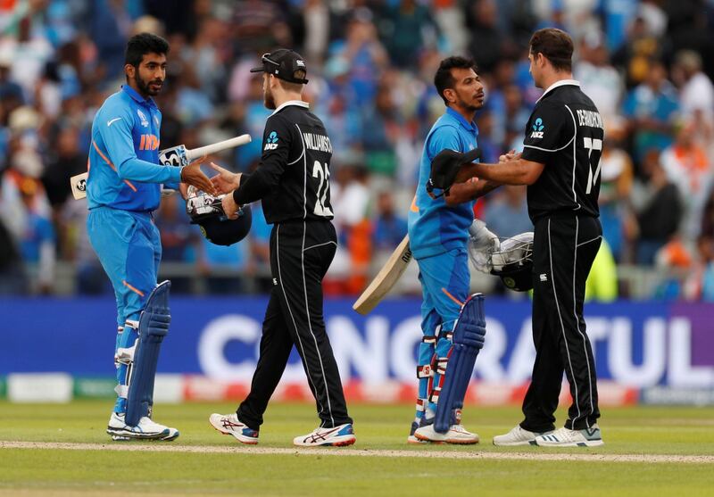 Players from the two sides shake hands post-match. Reuters