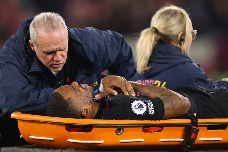 Ivan Toney of Brentford reacts after being stretchered off with an injury. Getty Images