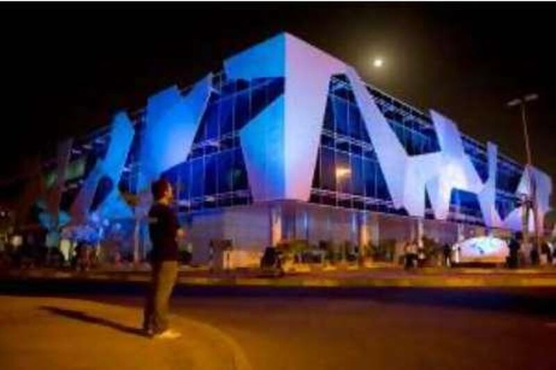 Abu Dhabi - November 13, 2008: The Imperial College London Diabetes Centre is lit up during a ceremony to turn on bright blue lights that will illuminate the centre for World Diabetes Day. ( Philip Cheung / The National )  *** Local Caption ***  PC0003-ICLDC.jpg