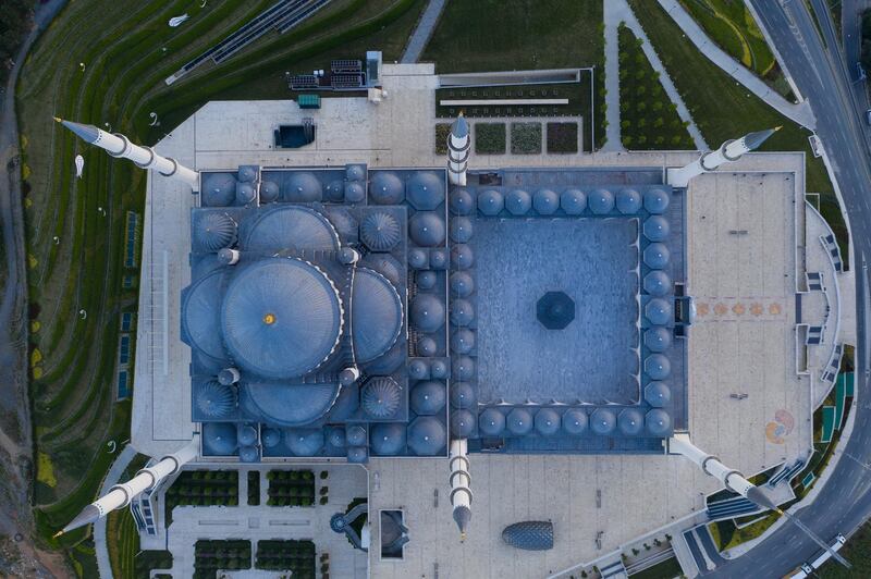 In this aerial photo from a drone, the courtyard and surrounding roads of the closed Grand Camlica Mosque are seen empty during a four-day lockdown to help stop the spread of the coronavirus in Istanbul, Turkey. Getty Images