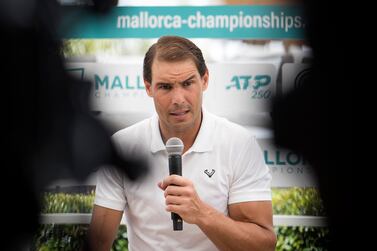 Spanish tennis player Rafael Nadal speaks during a press conference at Santa Ponsa Country club in Santa Ponsa, on the Spanish Balearic Island of Mallorca, on June 17, 2022.  - Rafael Nadal said he intends to play at Wimbledon but his final decision rests on how his troublesome left foot feels after training in London next week.  (Photo by JAIME REINA  /  AFP)