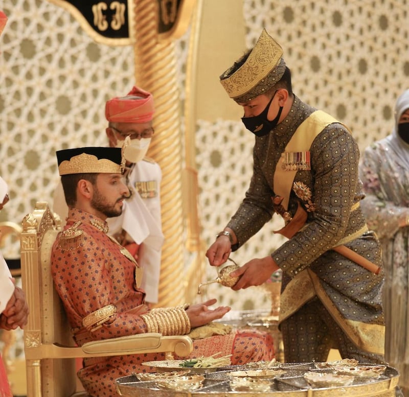 Abdullah Nabil Mahmoud Al-Hashimi during the pre-wedding ceremony, the berbedak mandi.