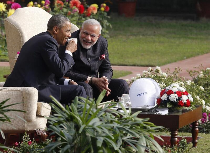 US president Barack Obama and India's prime minister Narendra Modi, right, talk over coffee in the gardens of Hyderabad House in New Delhi on January 25, 2015. Obama is visiting India for three days to attend Republic Day celebrations and meet with Indian leaders. Jim Bourg/Reuters