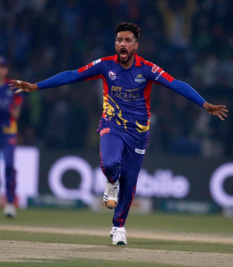 Karachi Kings' Mohammad Amir celebrates after taking the wicket of Lahore Qalandars' Fakhar Zaman during the PSL in Lahore on Sunday. AP