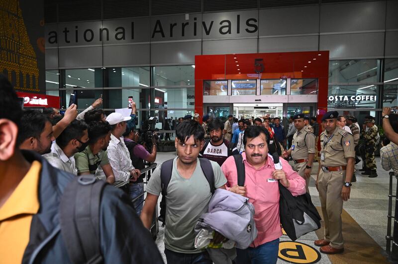 Indians evacuated from Sudan arrive on a flight at the Indira Gandhi International Airport in New Delhi, India. AP Photo