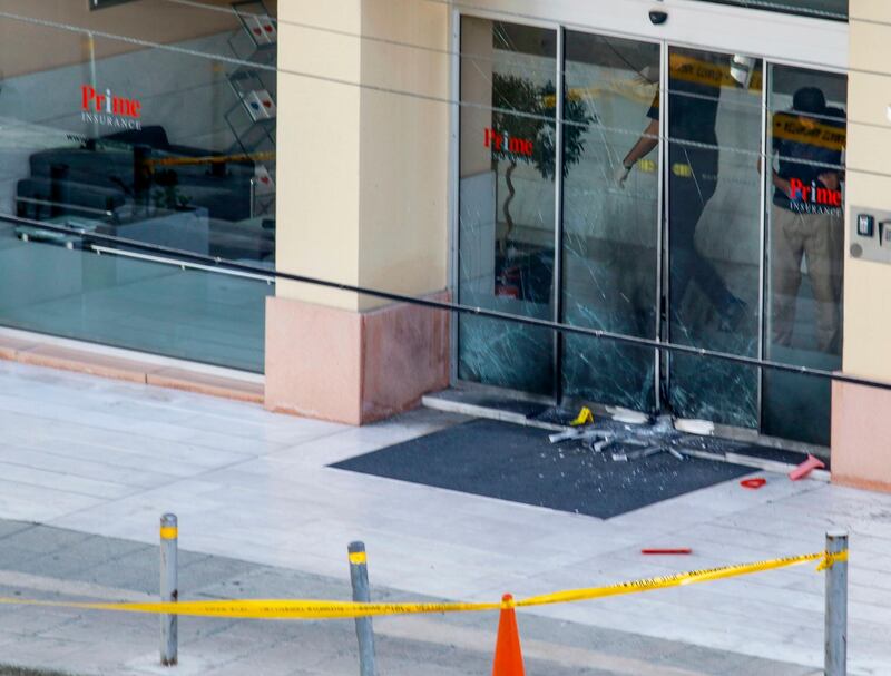 The exterior of the premises of an insurance company after a high-yield explosive device went off late the previous night in the Cypriot capital Nicosia.  AFP