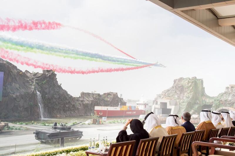 Dignitaries watch the Al Forsan aerobatic display team during the opening ceremony of the 2017 International Defence Exhibition and Conference. Mohamed Al Suwaidi / Crown Prince Court - Abu Dhabi