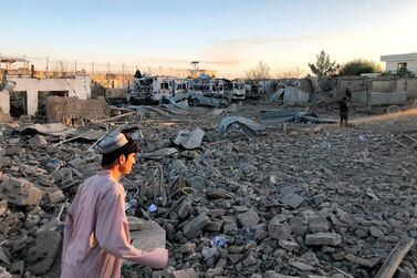 Afghan security members and people work at the site of a suicide attack in Zabul, Afghanistan, on Thursday, September 19, 2019. AP Photo