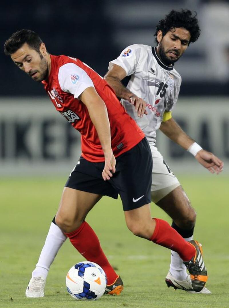 MIDFIELD - HUGO VIANA (Al Ahli): The late Bruno Metsu once talked about the importance of having a leader on the pitch and Ahli have been fortunate to have such a man on their books. A veteran of a European Championship and two World Cup campaigns with Portugal, the former Valencia, Sporting and Braga man has been at the heart of Ahli’s unprecedented success this season, organising the midfield and defence, and often advising the players around him. The experience of Viana, 31, has been invaluable. Karim Jaafar / AFP