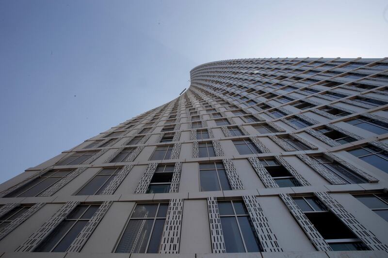 Dubai, United Arab Emirates - June 11 2013 - The Cayan Tower's infamous twist as seen from the 6th floor of the building facing upwards.  (Razan Alzayani / The National)