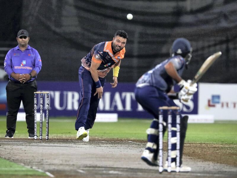 MGM's Mehboob Khan bowls in the Sharjah Ramadan Cup game between MGM Cricket Club v Pacific Group in Sharjah on April 27th, 2021. Chris Whiteoak / The National. 
Reporter: Paul Radley for Sport