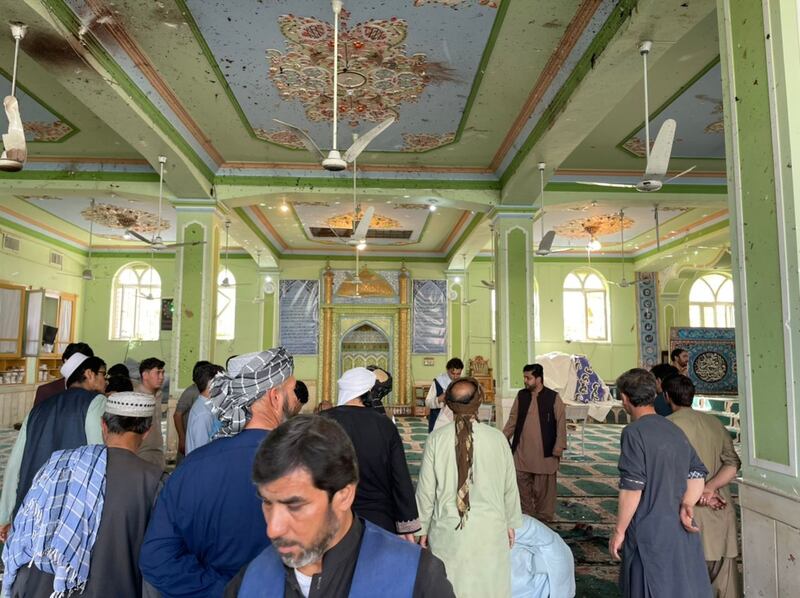 At least 30 people were killed in an explosion at a Shiite mosque in the southern Afghan city of Kandahar, during Friday prayers on October 15. All photos: Anadolu Agency via Getty Images