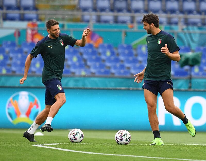 Domenico Berardi and Manuel Locatelli of Italy in action during a training session ahead of the Euro 2020 kick-off against Turkey at Olimpico Stadium. Getty
