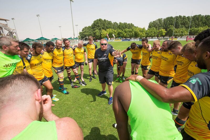 Dubai, United Arab Emirates - Coach Mike talking to his winning team at the Dubai Hurricanes vs Dubai Knight Eagles at The Sevens, Dubai.  Leslie Pableo for The National