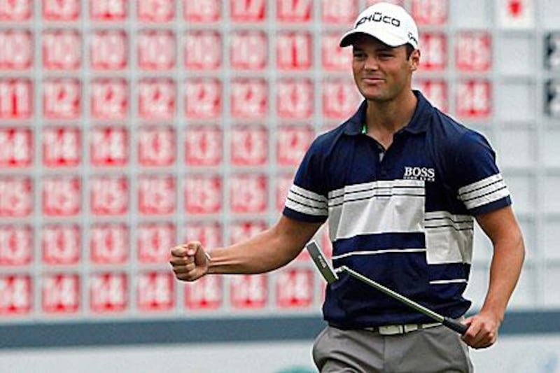 Martin Kaymer celebrates finsihing off his remarkable comeback win on the 18th green in Shanghai as his nine birdies on the last 12 holes sealed the HSBC Champions.