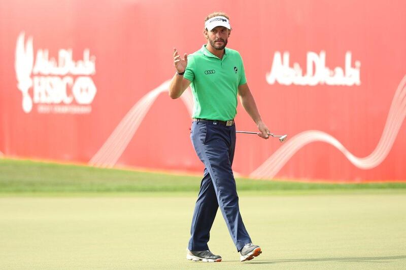 Joost Luiten acknowledges the crowd after finishing his second round tied for third on Friday at the Abu Dhabi HSBC Golf Championshp. Andrew Redington / Getty Images