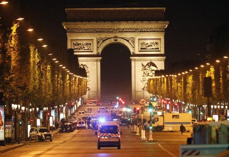 Police forces take positions on the Champs Elysees avenue in Paris, France, on April 20, 20167, after a fatal shooting in which a police officer was killed along with an attacker, Thursday, April 20, 2017. Kamil Zihnioglu / AP