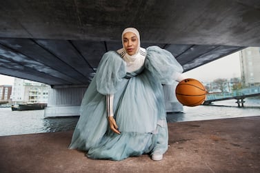 Hijab-wearing athlete Asma Elbadawi, who convinced the International Basketball Federation to remove the ban on religious head coverings on courts, stars on a billboard on Sheikh Zayed Road. Photo: adidas