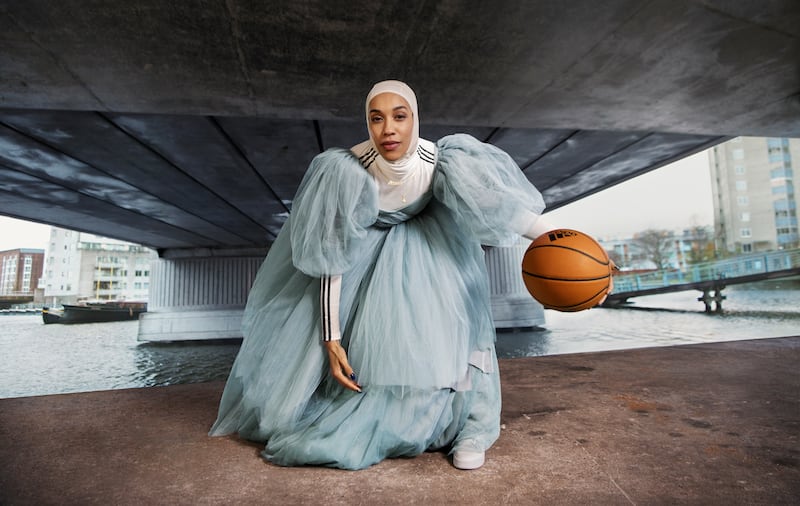 Hijab-wearing athlete Asma Elbadawi, who convinced the International Basketball Federation to remove the ban on religious head coverings on courts, stars on a billboard on Sheikh Zayed Road. Photo: adidas