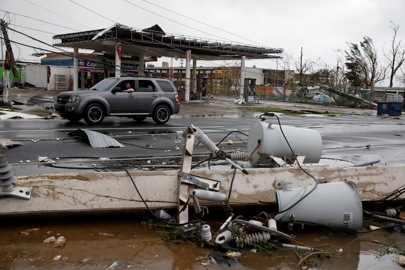 Damaged electrical installations are seen after the area was hit by Hurricane Maria en Guayama, Puerto Rico. Carlos Garcia Rawlins / Reuters