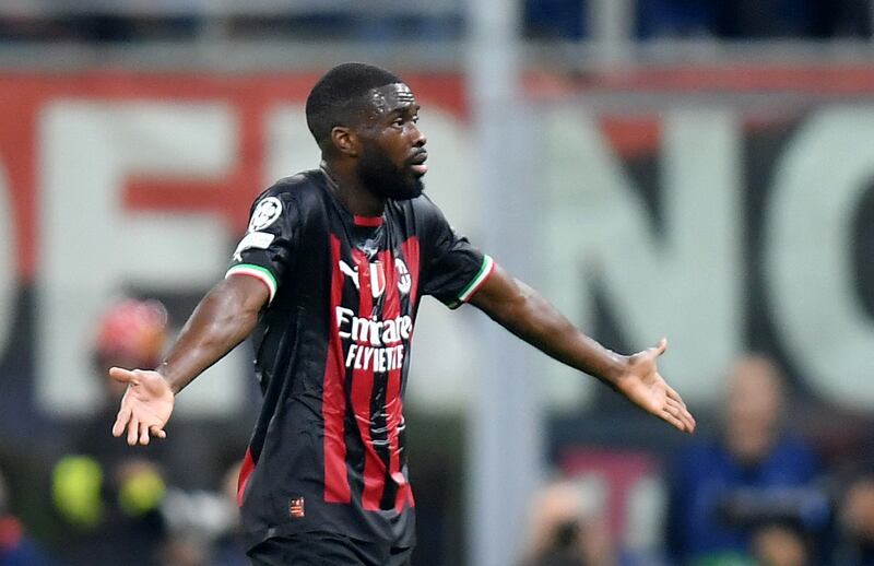 AC Milan defender Fikayo Tomori after being shown a red card by referee Daniel Siebert. Reuters