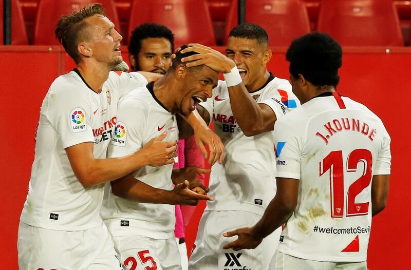 Sevilla's Fernando celebrates scoring their second goal against Real Betis  at the Ramon Sanchez Pizjuan Stadium on Thursday, June 12. Seville won the match 2-0 as La Liga returned to action for the first time since the coronavirus lockdown. Reuters