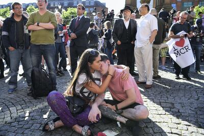 MANCHESTER, ENGLAND - MAY 23:  Members of the public gather to attend a candlelit vigil, to honour the victims of Monday evening's terror attack, at Albert Square on May 23, 2017 in Manchester, England. Monday's explosion occurred at Manchester Arena as concert goers were leaving the venue after Ariana Grande had just finished performing. Greater Manchester Police are treating the explosion as a terrorist attack and have confirmed 22 fatalities and 59 injured.  (Photo by Jeff J Mitchell/Getty Images)