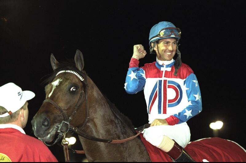 27 Mar 1996:  Gerry Bailey of the USA on Cigar punches the air in celebration after winning the Dubai World Cup at Nad-Al-Shiba in Dubai, United Arab Emirates. \ Mandatory Credit: Phil  Cole/Allsport