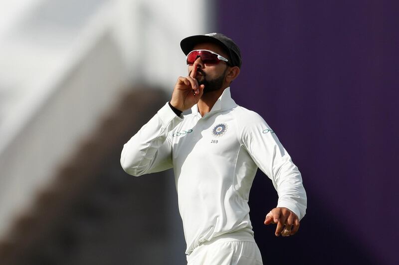 Cricket - England v India - First Test - Edgbaston, Birmingham, Britain - August 1, 2018   India's Virat Kohli celebrates after running out England's Joe Root   Action Images via Reuters/Andrew Boyers