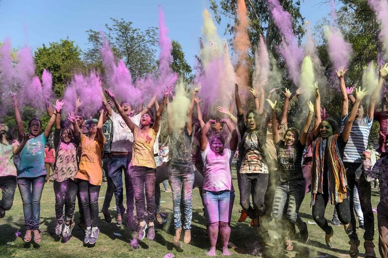 Students from Lalbhai Dalpatbhai (LD) College of Engineering celebrate 'Holi', the Hindu spring festival, with eco-friendly coloured powders in Ahmedabad on March 7, 2020. Holi, the popular Hindu spring festival of colours is observed in India and across countries at the end of the winter season on the last full moon of the lunar month. AFP