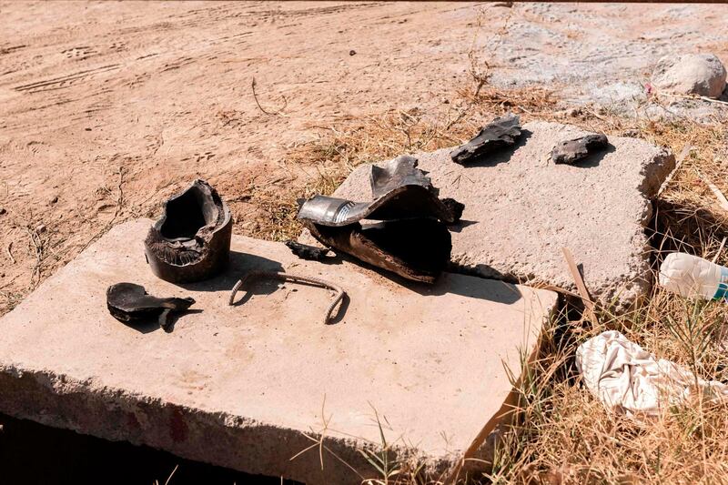 A picture taken on September 12, 2019 shows shrapnel found on the grounds of the Acapulco hotel in Kyrenia (Girne) in the self-proclaimed Turkish Republic of Northern Cyprus (TRNC) north of the divided Cypriot capital Nicosia, after the building was damaged when a military depot exploded nearby. Multiple explosions at a Turkish military base in northern Cyprus damaged a hotel in a neighbouring holiday resort early Thursday, prompting the evacuation of terrified tourists, officials said. / AFP / Iakovos Hatzistavrou
