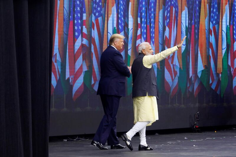 U.S. President Donald Trump and Indian Prime Minister Narendra Modi take the stage during a "Howdy, Modi" rally celebration at NRG Stadium in Houston, Texas, U.S. September 22, 2019. REUTERS/Daniel Kramer