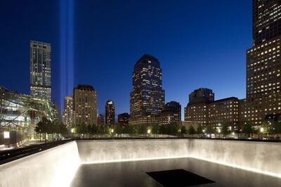 The Tribute in Light shines above a reflecting pool at the National September 11 Memorial on the anniversary of the terrorist attacks. Photo: AP