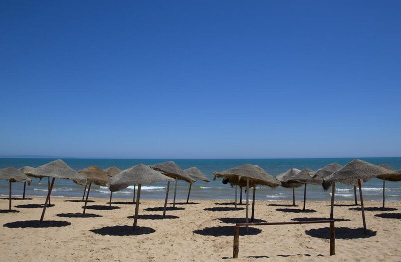 Tunisia began deploying armed police around tourist sites after the recent massacre at a beach resort which has left the economy ailing and popular areas deserted. Kenzo Tribouillard / AFP