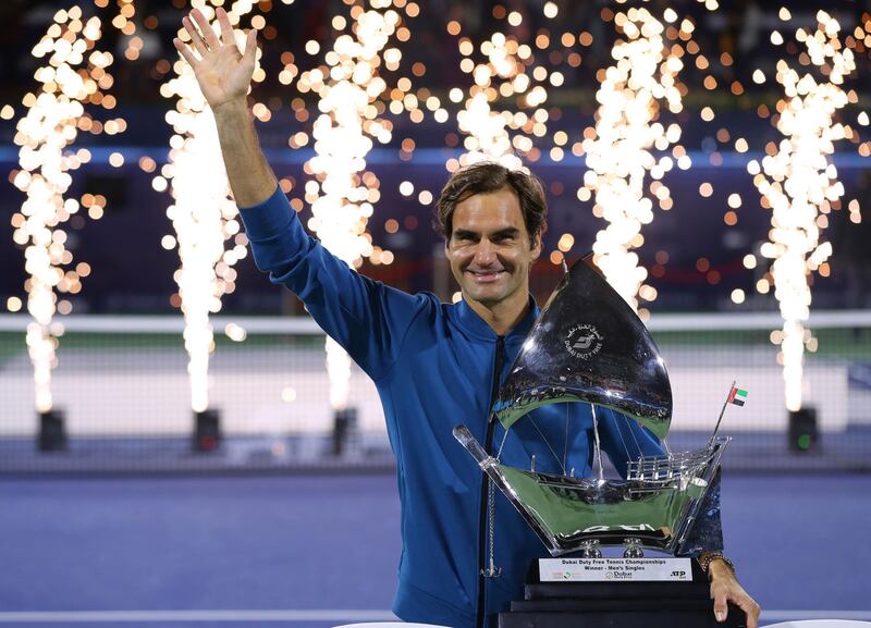 DUBAI, UNITED ARAB EMIRATES - MARCH 02: Rodger Federer of Switzerland poses with the winners trophy after victory during the Dubai Duty Free Championships at Dubai Tennis Stadium on March 02, 2019 in Dubai, United Arab Emirates. (Photo by Francois Nel/Getty Images)