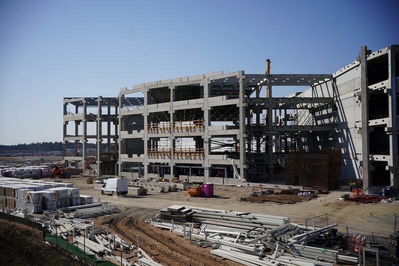 A building under construction at the Tesla factory.   EPA