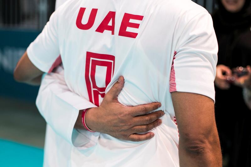 ABU DHABI, UNITED ARAB EMIRATES - March 20 2019.

UAE's handball team embrace as they celebrates their win agains Russia at the Special Olympics World Games in ADNEC.

 (Photo by Reem Mohammed/The National)

Reporter: 
Section:  NA