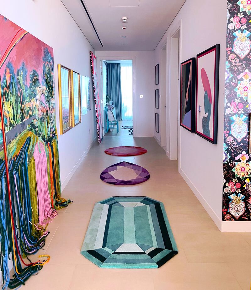 A trio or more of rugs can adorn a hallway to pleasing effect. Photo: Wear the House