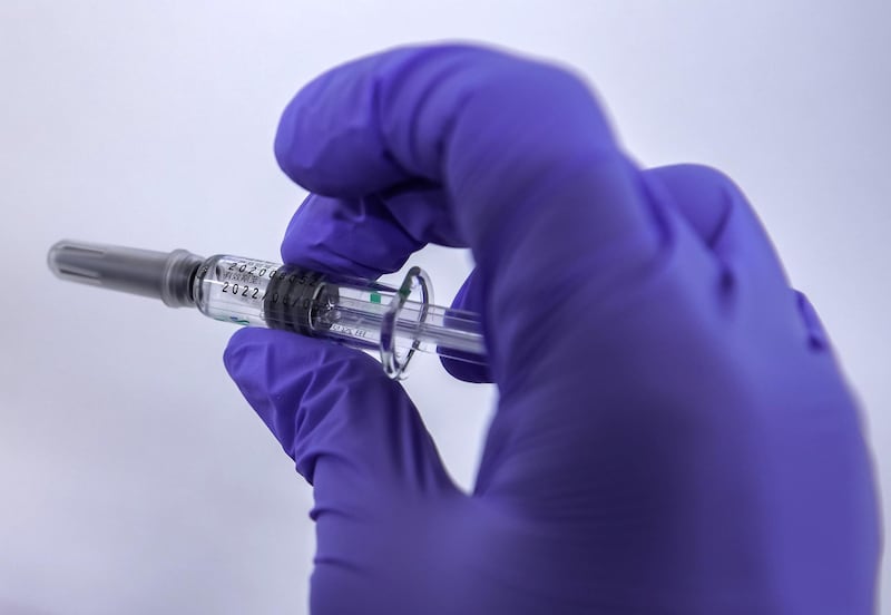 Abu Dhabi, United Arab Emirates, January 12, 2021. SEHA Vaccination Centre at the Abu Dhabi Cruise Terminal area.  Abdulaziz Karmastaji gets vaccinated.
Victor Besa/The National
Section:  NA
Reporter:  Shireena Al Nowais